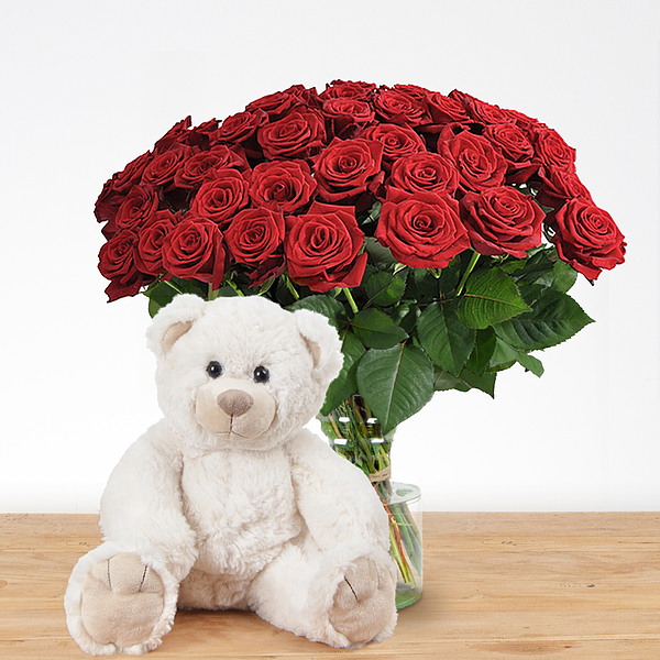 ours en peluche avec des roses